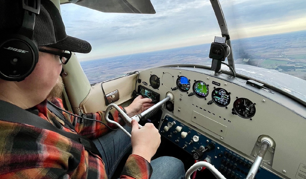 An in-flight view of Jason's Cessna 170B panel showcasing the sleek integration of Garmin GI 275 instruments, consolidating multiple gauges into a few streamlined displays. Key engine info, previously located across the panel, is now prominently placed in the pilot's line of sight for enhanced visibility.
