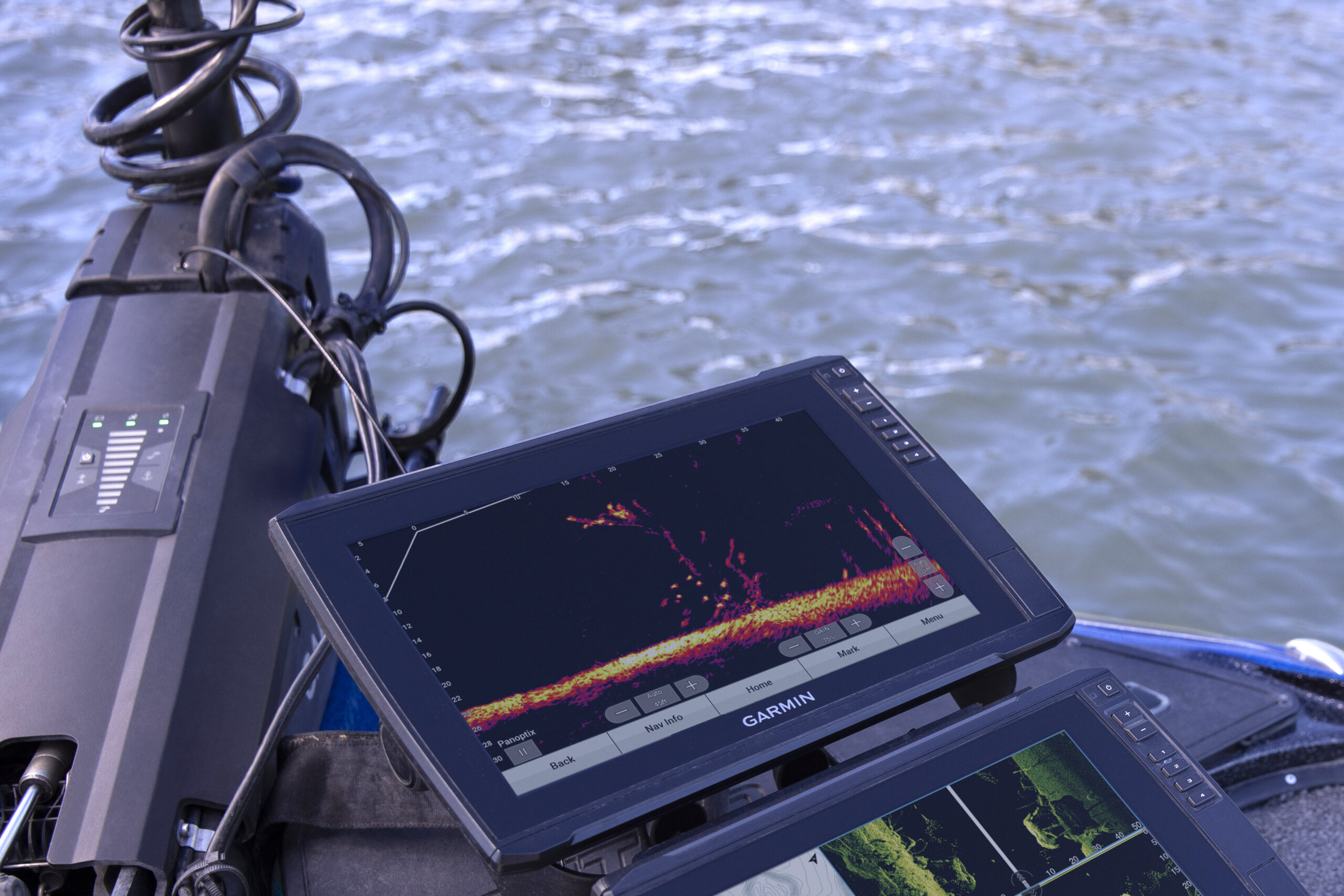 Up close shot of LiveScope on someones boat and water in the background.